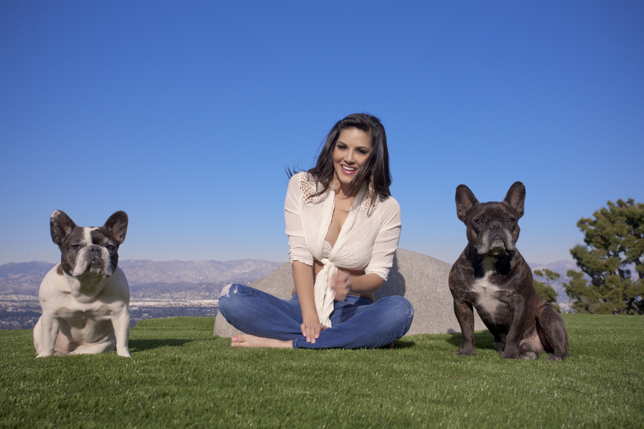 Sunny Leone Playing With Her Puppies